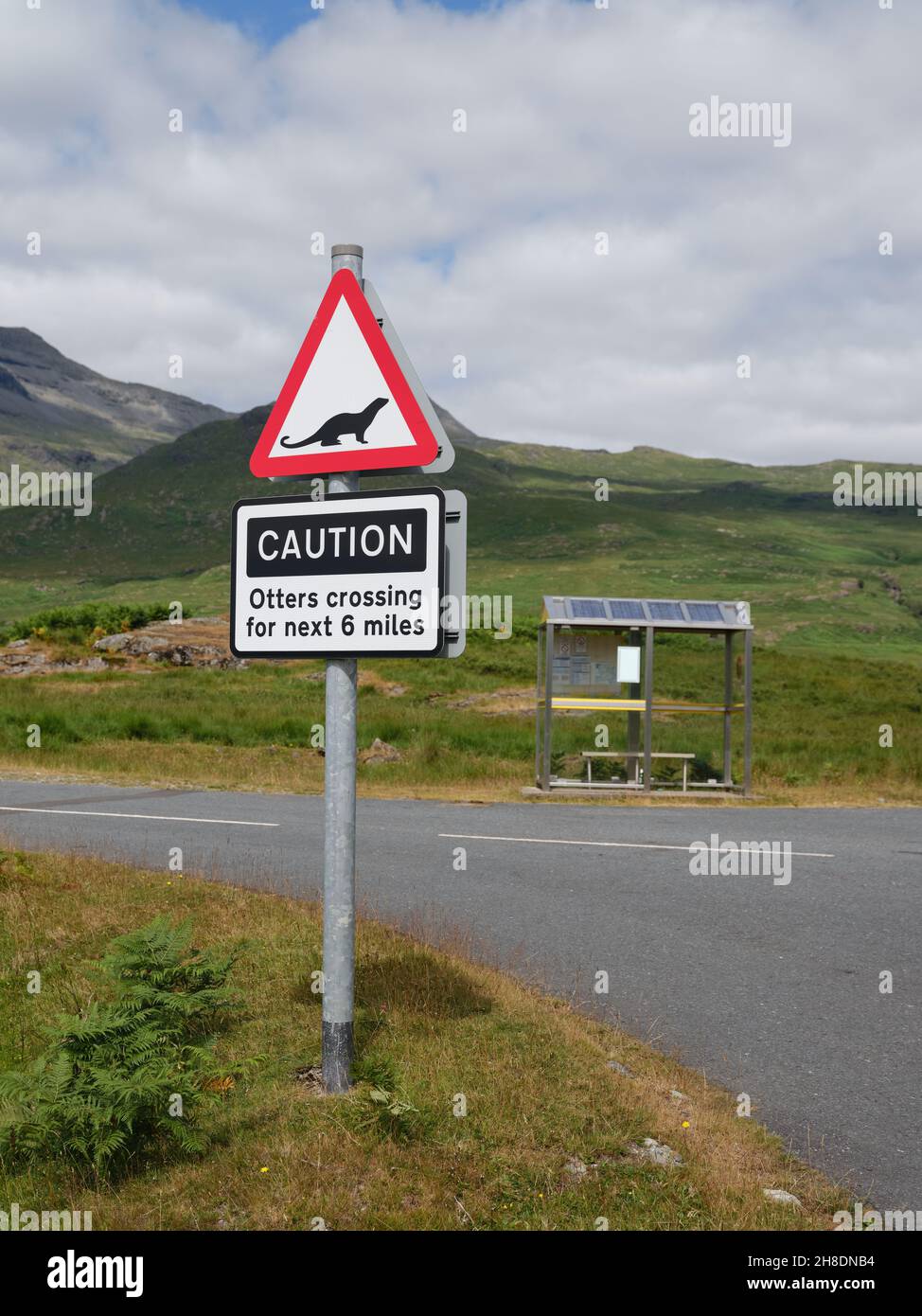 Caution Otter Crossing road sign warning on the Isle of Mull in Scotland UK - Otter conservation protection Stock Photo