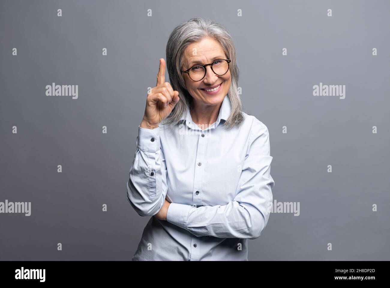 Older woman middle finger up hi-res stock photography and images - Alamy