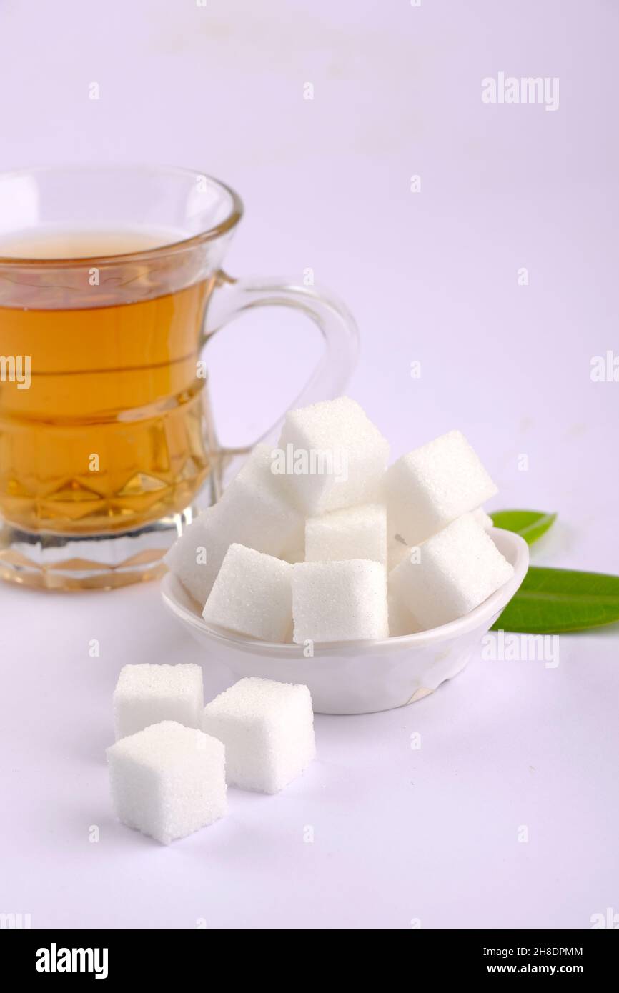 Refined sugar cubes on white background. Stock Photo