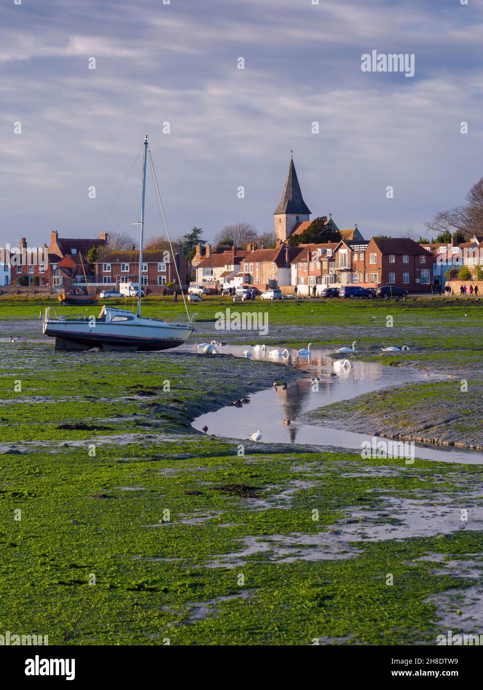 The village of Bosham beside Chichester Harbour at low tide, West Sussex, England. Stock Photo