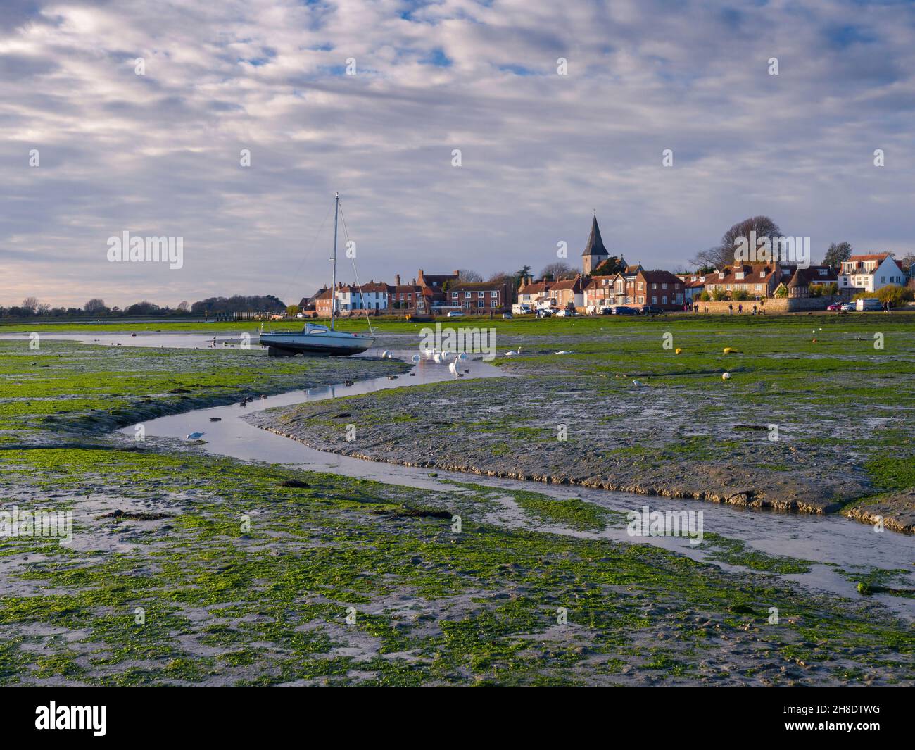 The village of Bosham beside Chichester Harbour at low tide, West Sussex, England. Stock Photo