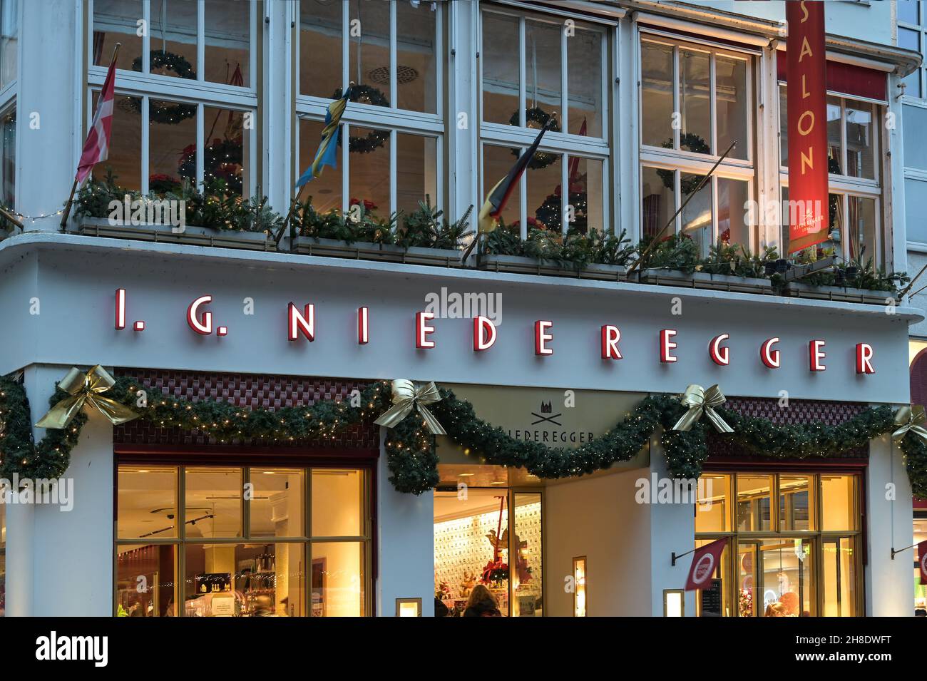 Lubeck, Germany, November 19, 2021: Sales building and cafe with Christmas decorations from the famous marzipan manufacturer Niederegger in Luebeck du Stock Photo