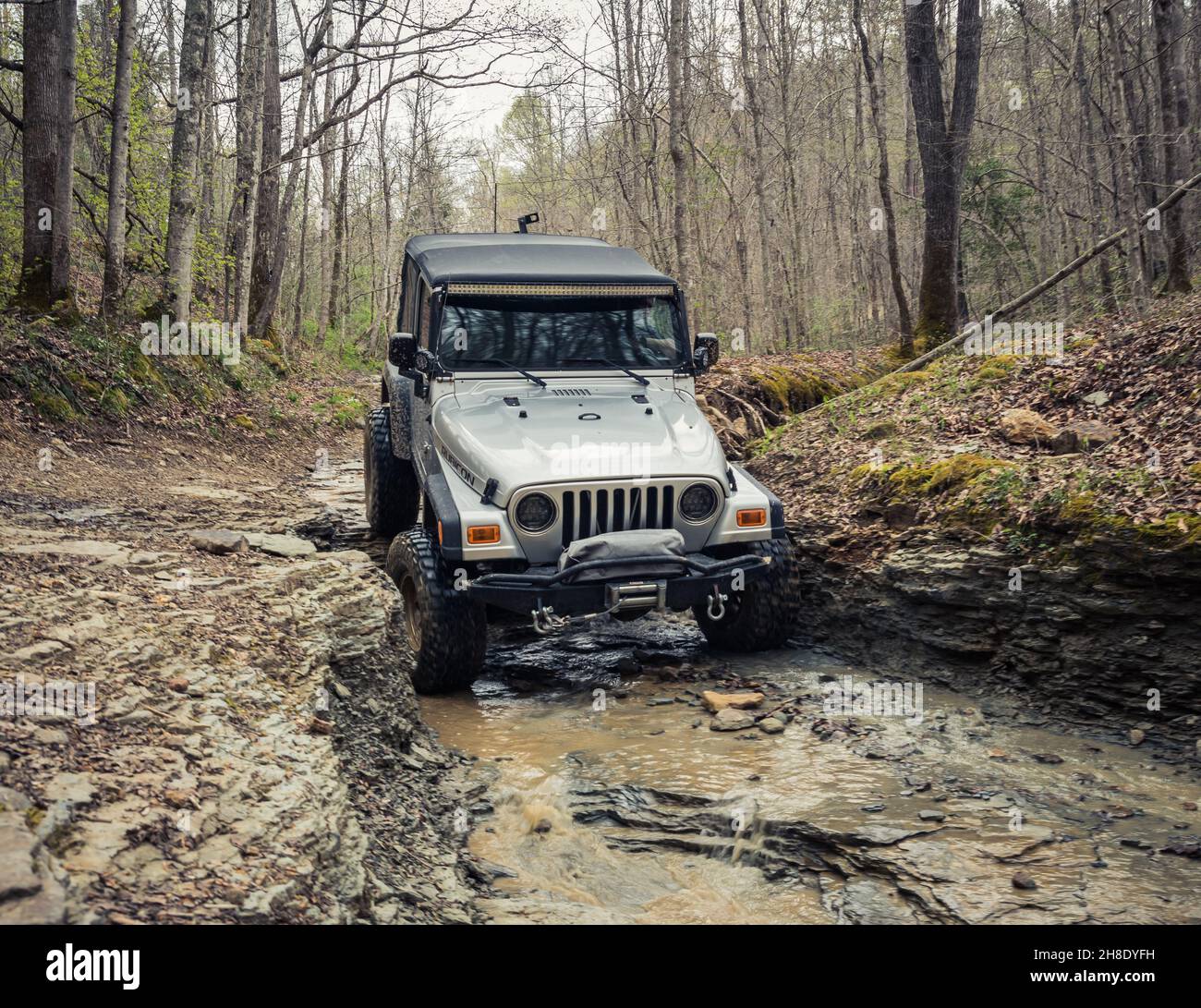 STANTON, UNITED STATES - Apr 14, 2021: A jeep wrangler off-road driving in  mud Stock Photo - Alamy