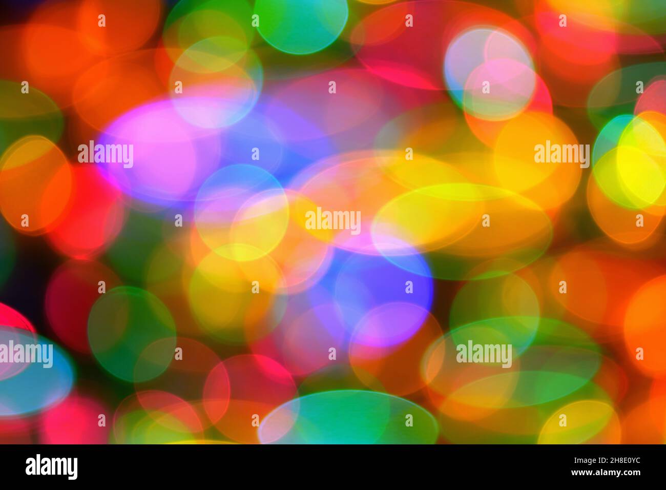 Abstract multicolored Christmas light in bokeh as background Stock Photo