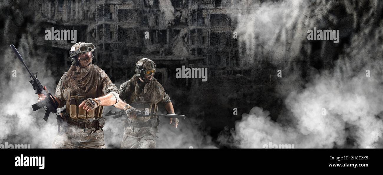 Two mercenary soldiers walk after the successful completion of the operation against the backdrop of a destroyed city. Modern warfire concept. Collage Stock Photo