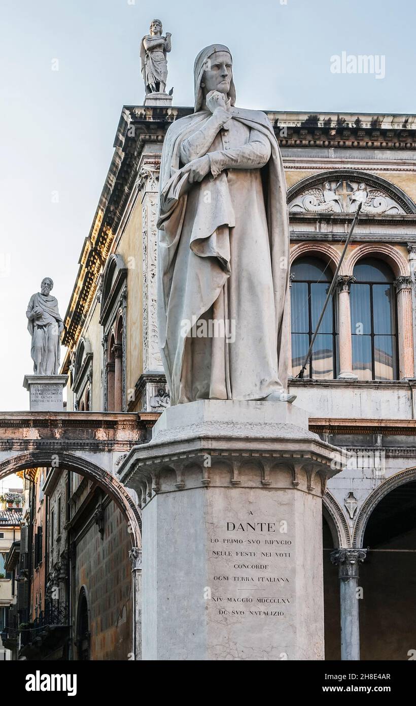 The monument of Dante Alighieri, created by Hugo Zannoni, was established to the sixteenth anniversary of the poet (1865) on the square in Verona. Ita Stock Photo