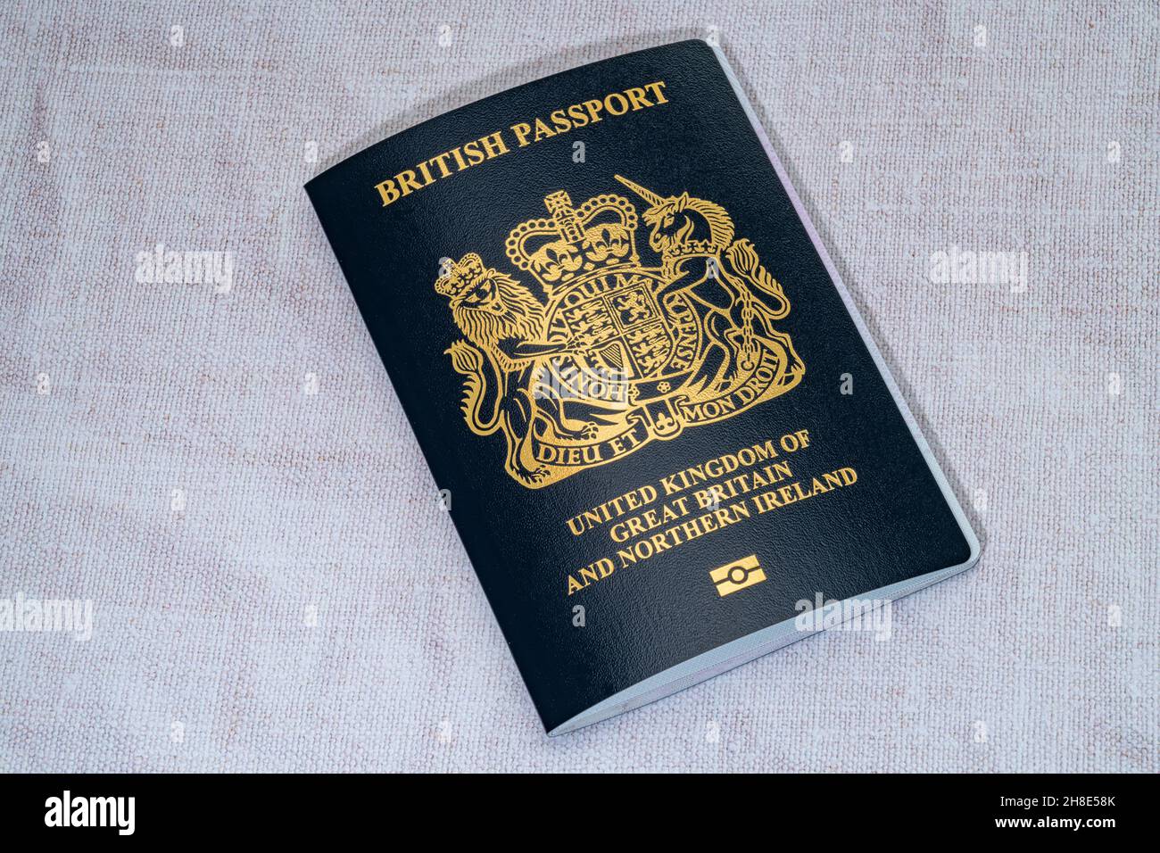 Close-up image of the latest style blue British Passport.   This passport replaces the red UK passport following Brexit Stock Photo