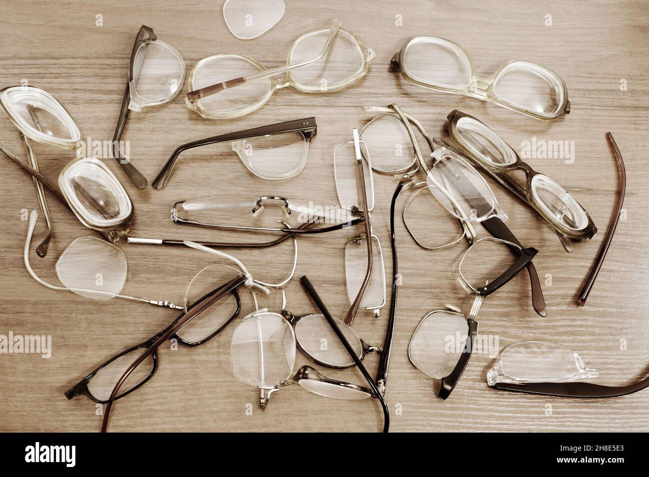 A lot of various broken glasses for reading Stock Photo