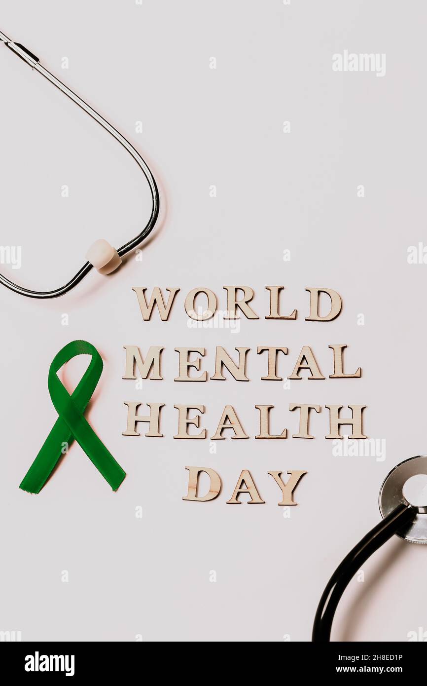 Green velvet ribbon on white background. World Mental Health Day ...