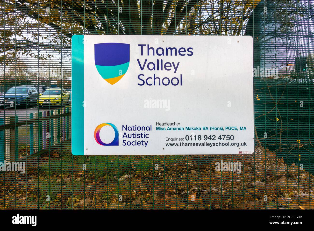 A sign attached to a fence outside Thames Valley school at Tilehurst, Reading, UK. Stock Photo