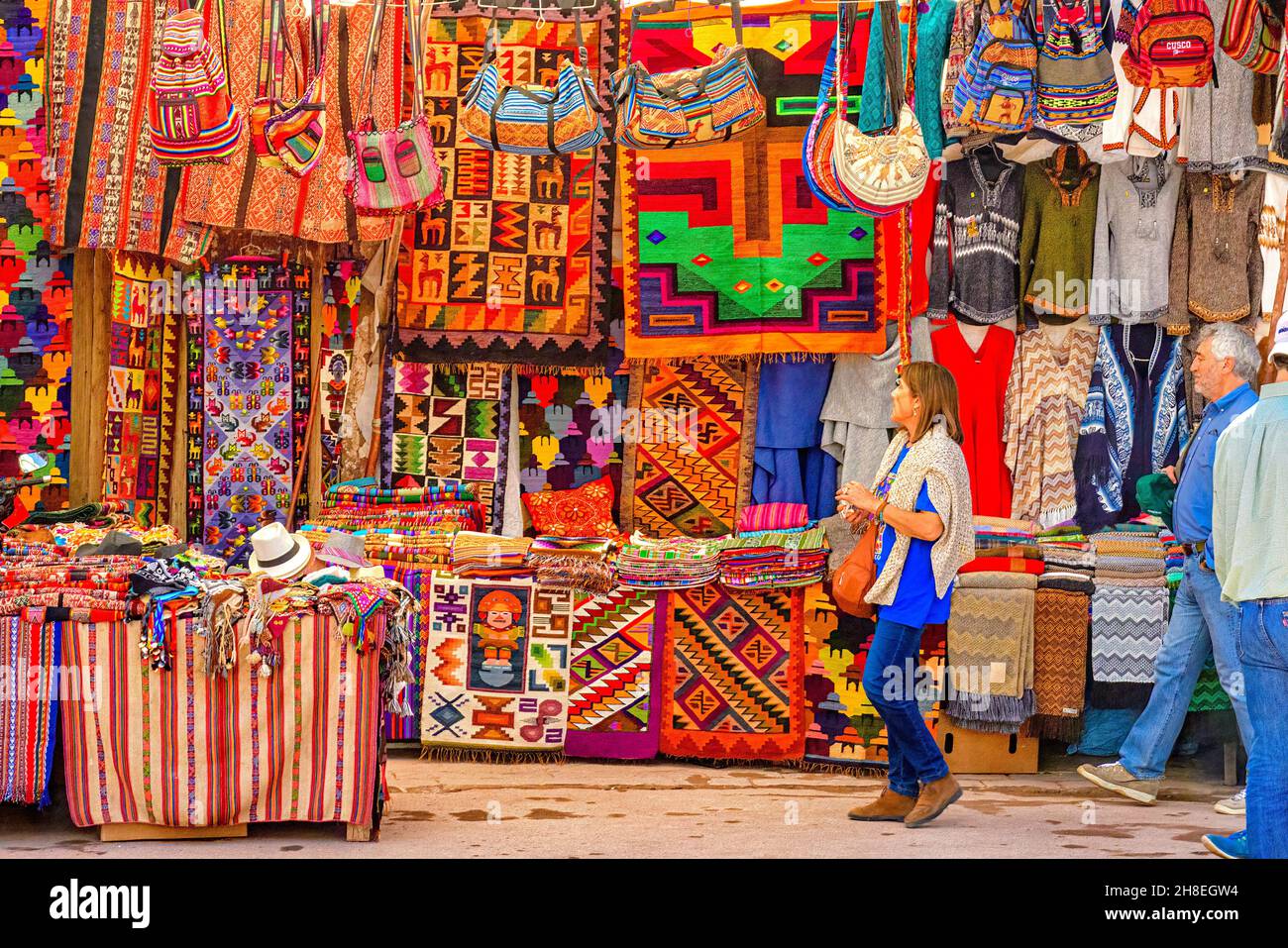 Peruvian textiles on sale in the Pisac Market, Peru Stock Photo