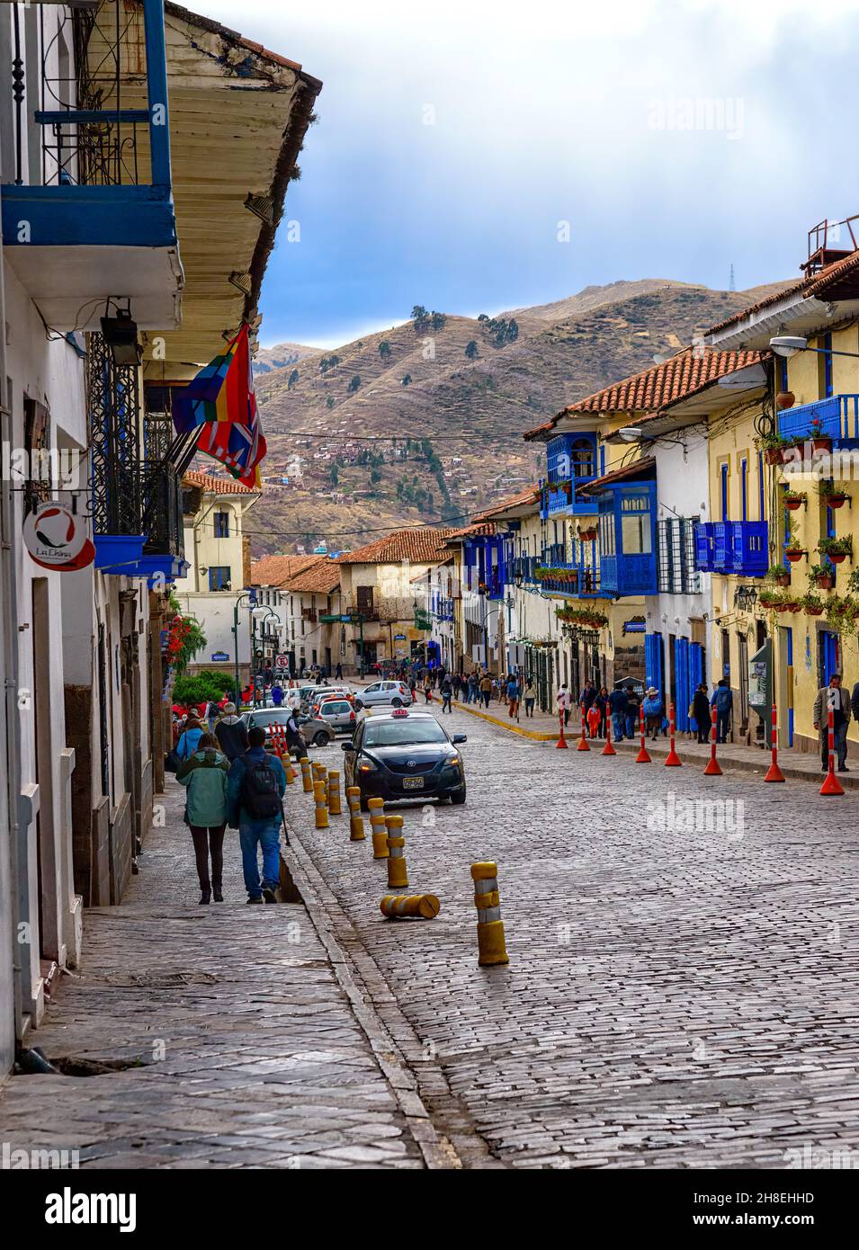 Cusco Street with characteristic Blue Windows, Shutters and Balconies Stock Photo