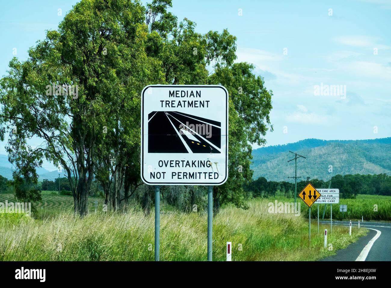 Overtaking not permitted highway signpost Stock Photo Alamy