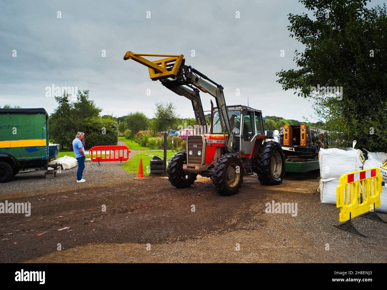 Marine surveyor looks on while narrowboat William is taken out of water
