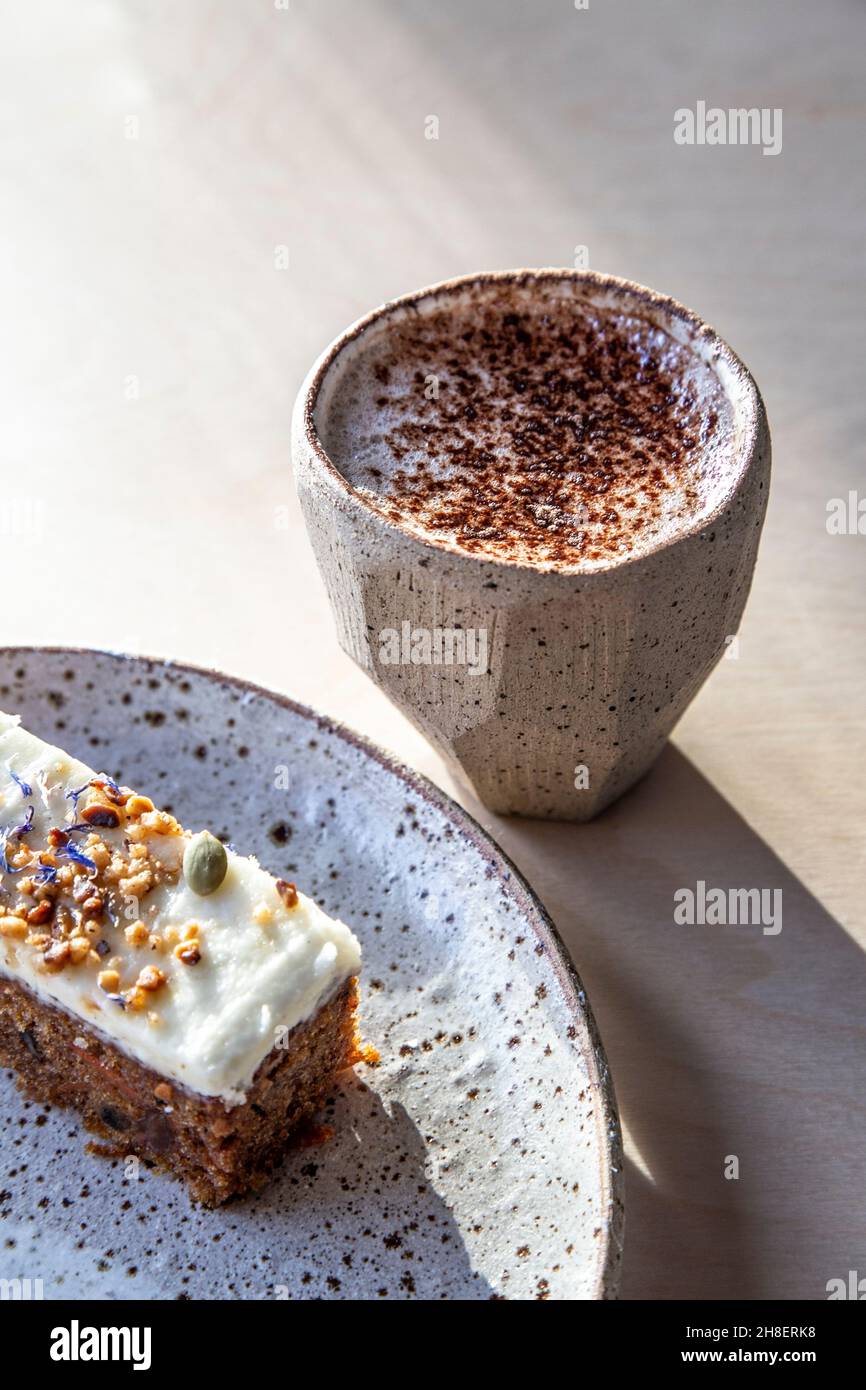 Coffee and cake (The Fixagon cafe near Angel and Dalston, London, UK) Stock Photo