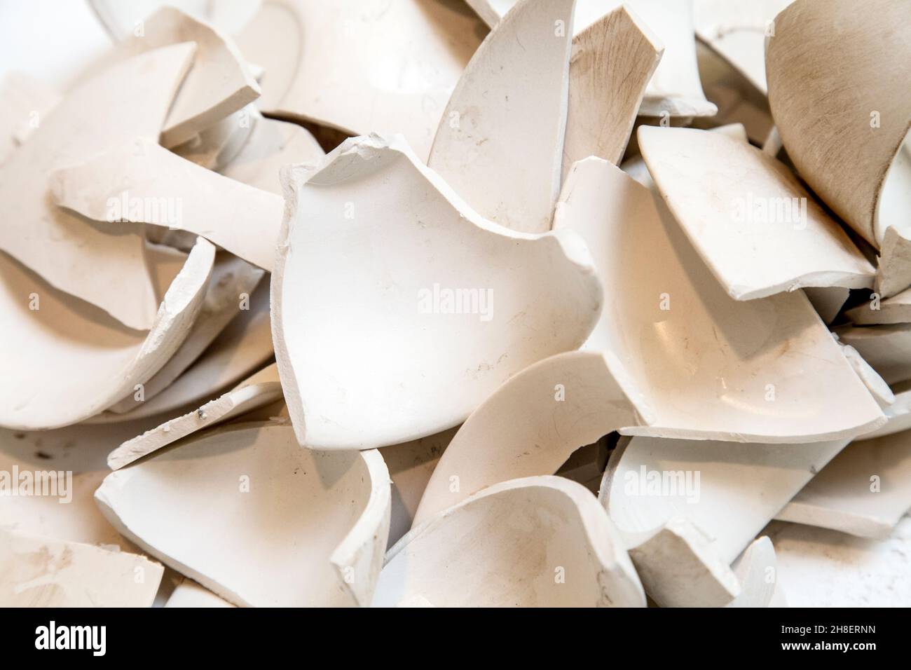 Broken ceramic pieces, part of Yoko Ono's MEND PIECE for London interactive installation, Whitechapel Gallery, London, UK Stock Photo