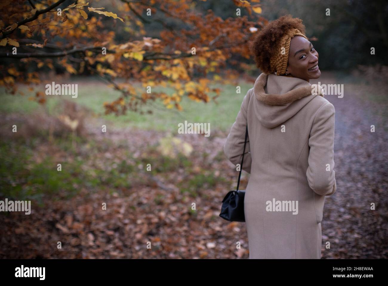 Woman coat back view turning hi-res stock photography and images - Alamy