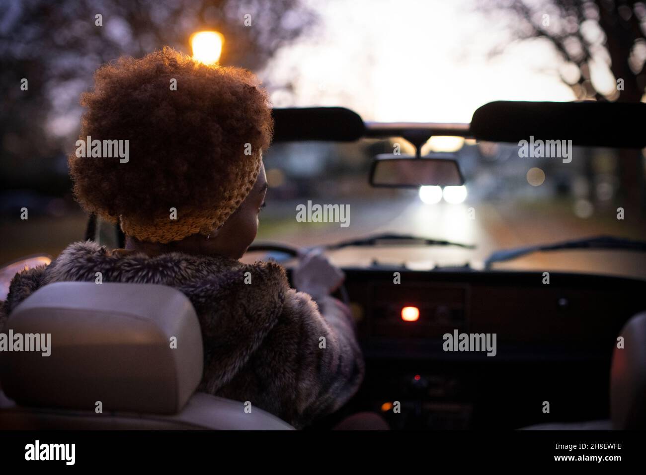 Woman street night rear view hi-res stock photography and images - Alamy