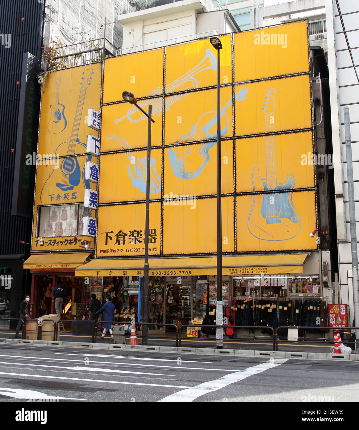 Guitar and other musical instrument shops and stores line both sides of Ochanomizu Street in