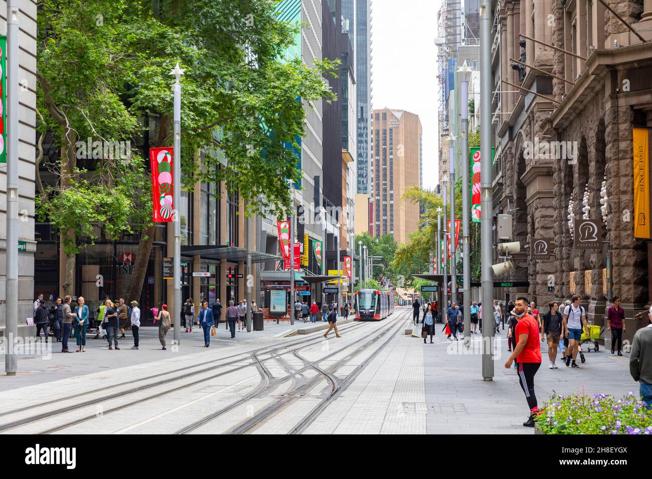 George street Sydney during december 2021 with christmas decorations and banners, the city is recovering from covid 19 lockdown Stock Photo