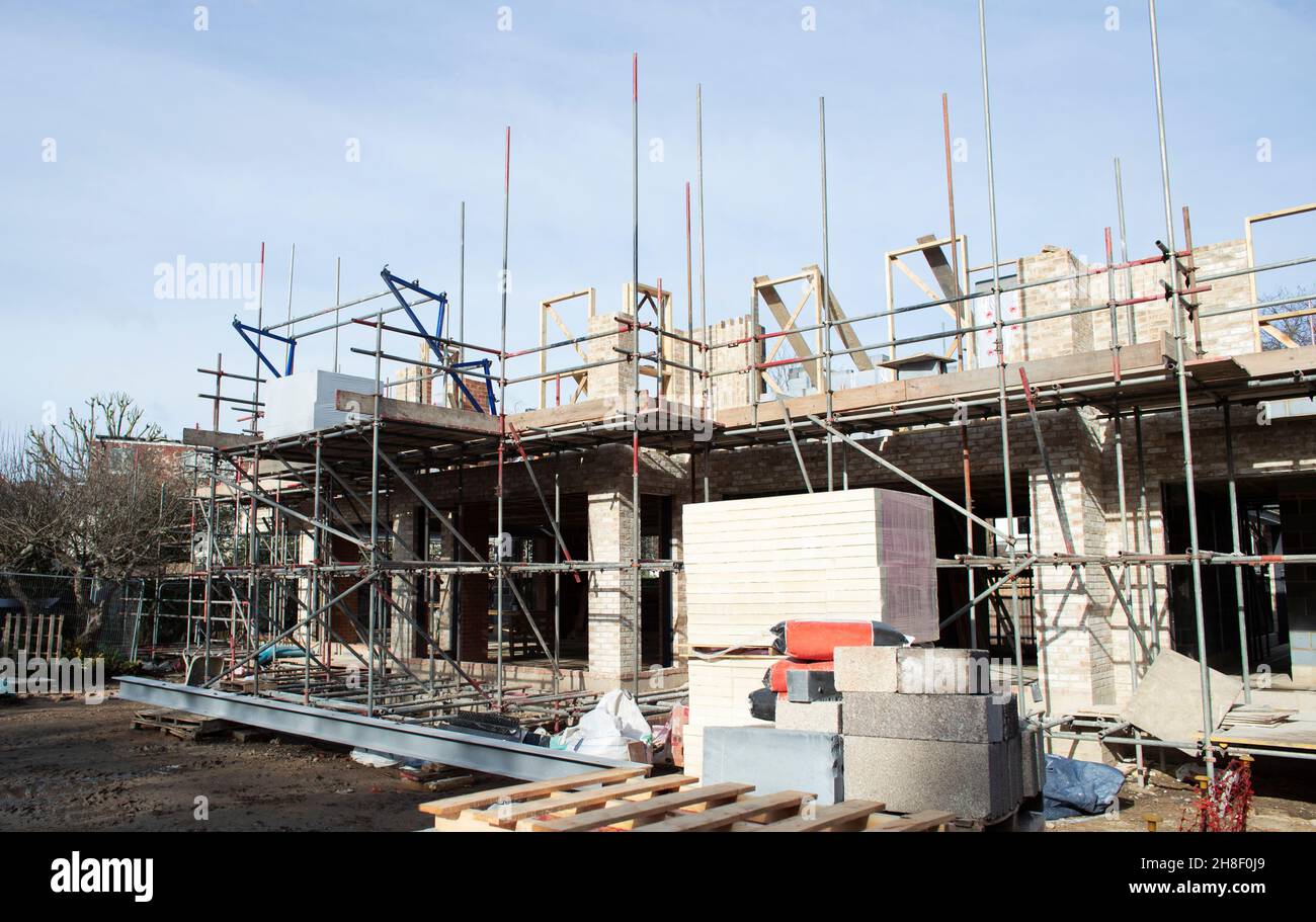 Scaffolding over building under construction Stock Photo