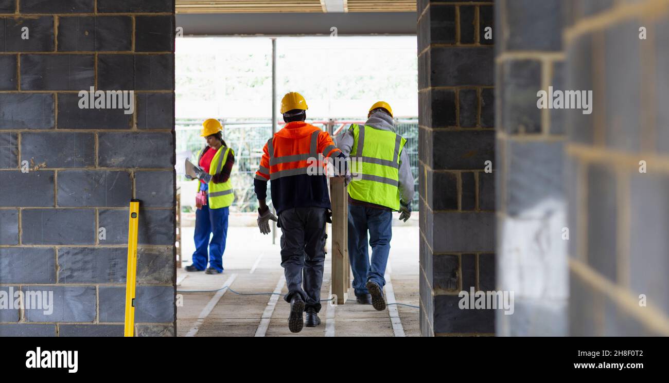 Construction workers at construction site Stock Photo