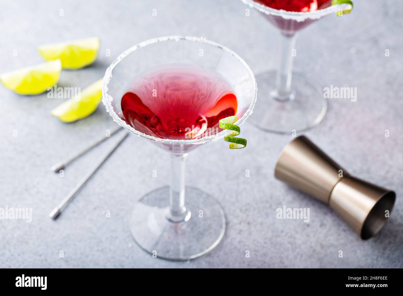 Traditional Cosmopolitan martini with sugar rim and garnish Stock Photo