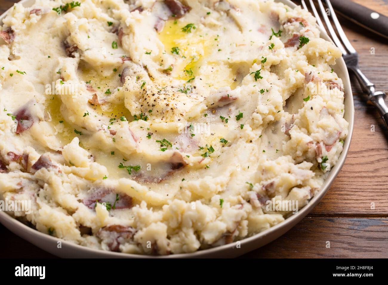 Traditional southern mashed potatoes made with red potatoes Stock Photo