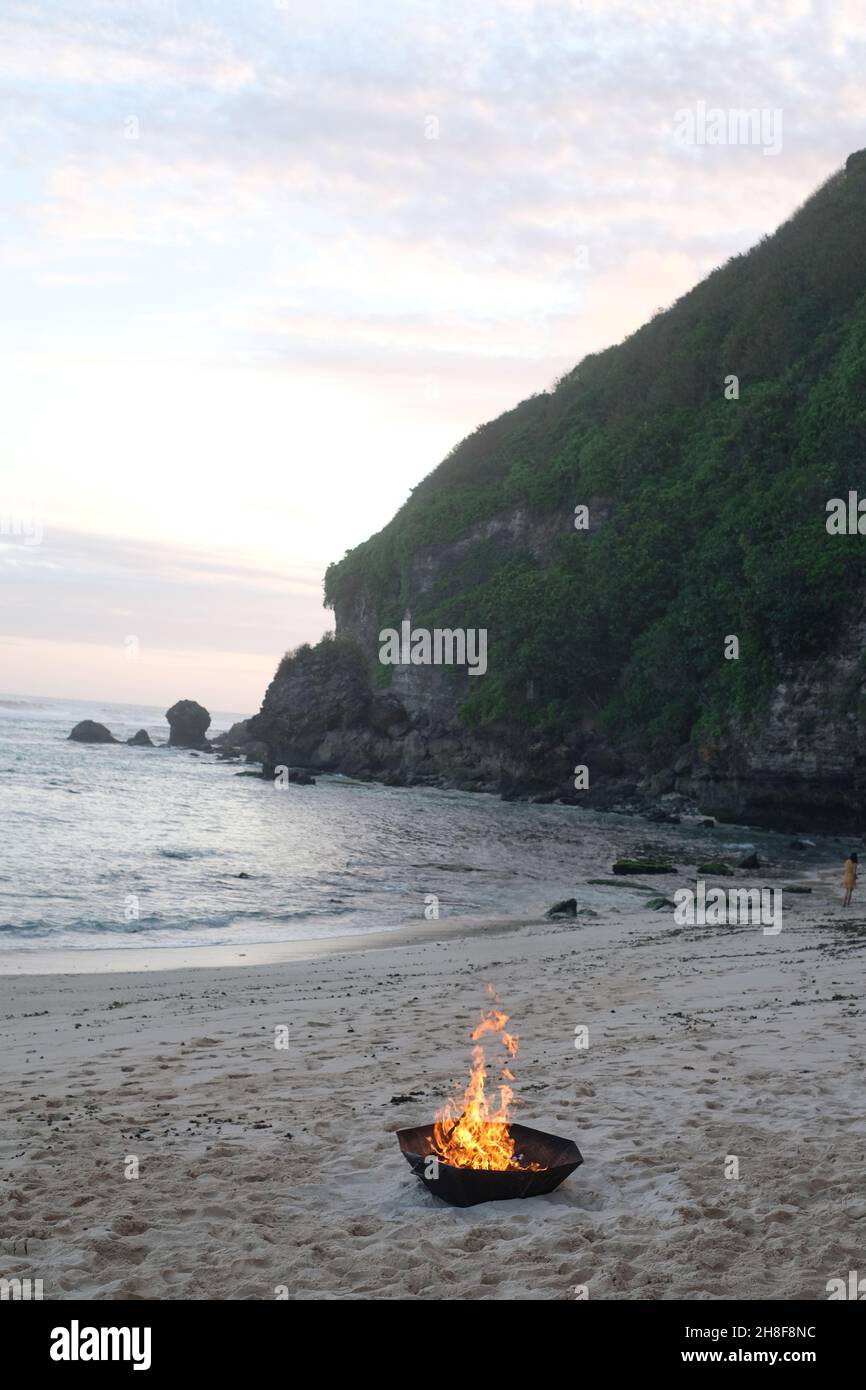 Beach bonfire at Sundays Beach Club in Bali, Indonesia at sunset Stock Photo