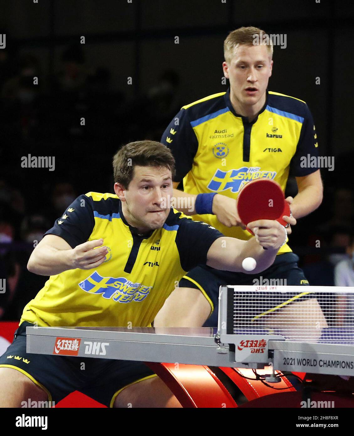 Sweden's Kristian Karlsson (L) and Mattias Falck play in the men's doubles  final at the table tennis world championships in Houston on Nov. 29, 2021.  (Kyodo)==Kyodo Photo via Credit: Newscom/Alamy Live News