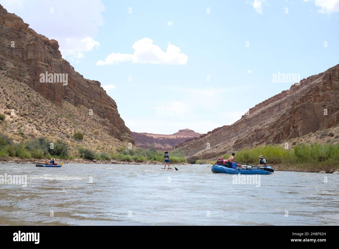 Group multi-day white water rafting trip kayaking and SUPping down the San Juan River through Bears Ears National Monument, Utah Stock Photo