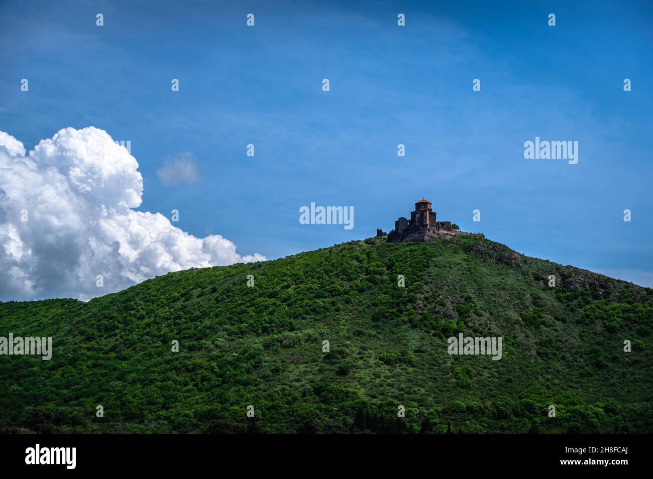 Scenic view of Jvari Monastery against cloudy skies in the city of Mtskheta, Georgia. Stock Photo