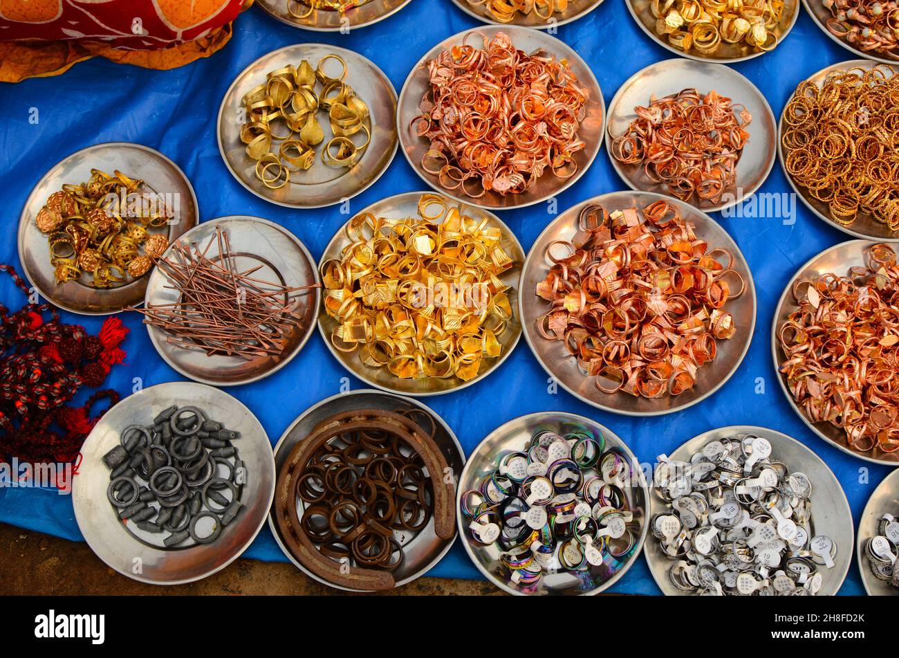 Rings and jewelery made of various metals are being sold Stock Photo