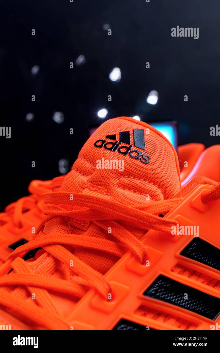 Tyumen, Russia-November 13, 2021: Adidas logo on running shoes. Adidas is  the second biggest sportswear manufacture in the world. Vertical photo  Stock Photo - Alamy