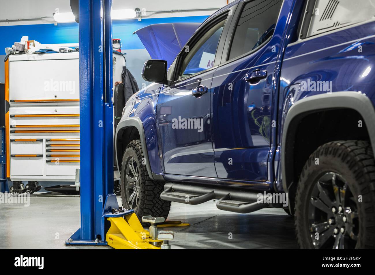 Blue Modern Pickup Truck Scheduled Maintenance Inside Dealership Auto