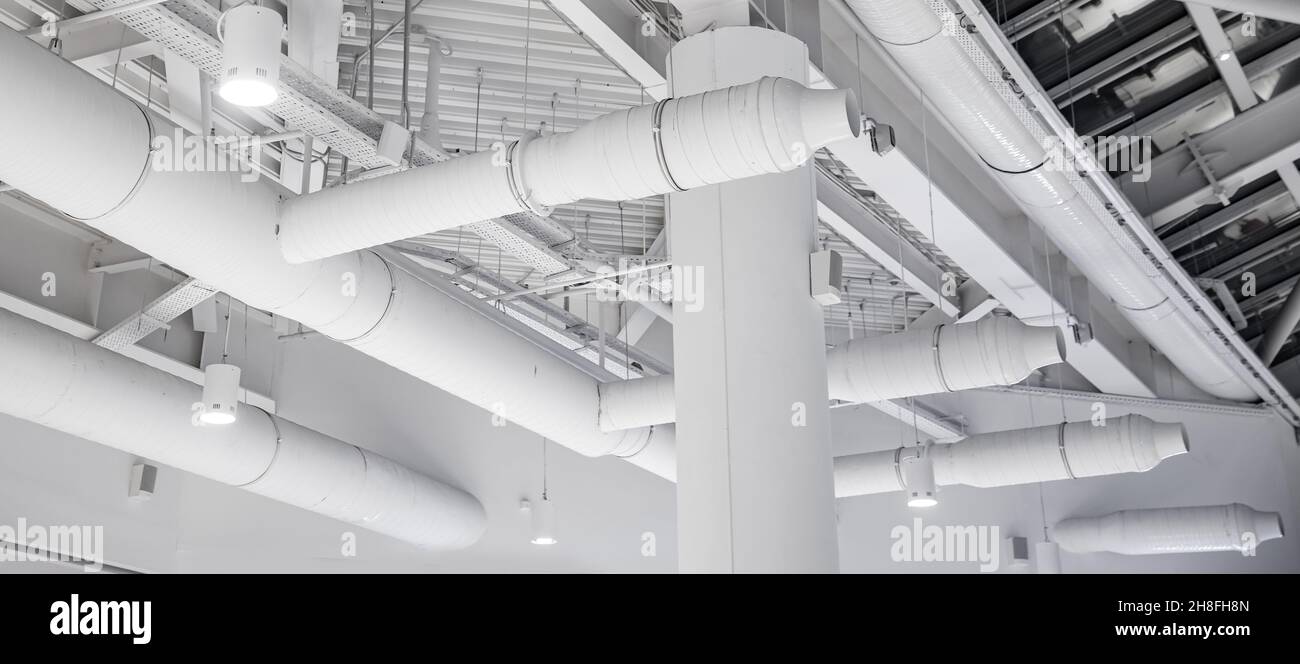 Ventilation pipes hvac duct tube hanging from ceiling store inside for