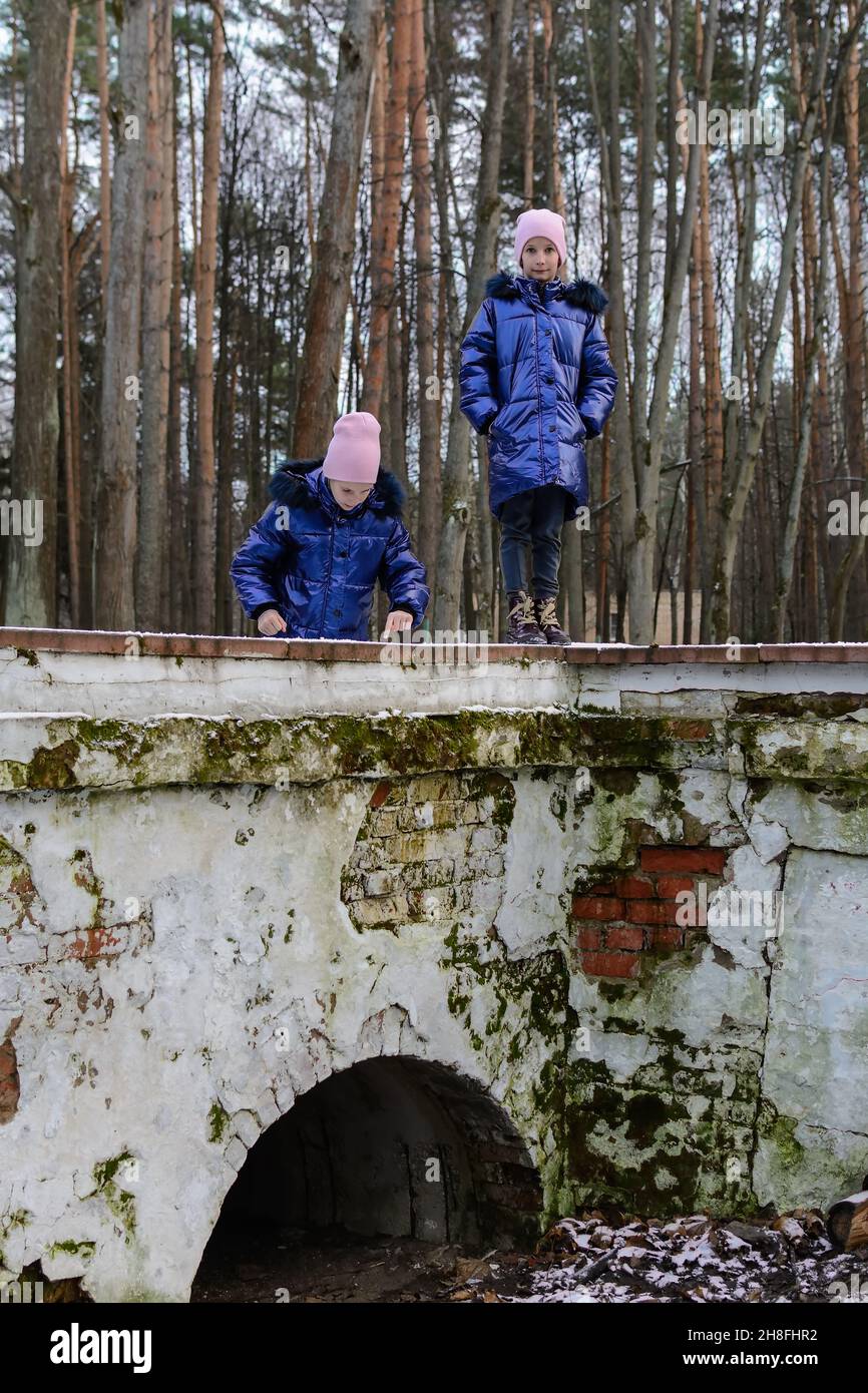 Two girls playing in the forest hi-res stock photography and images - Alamy