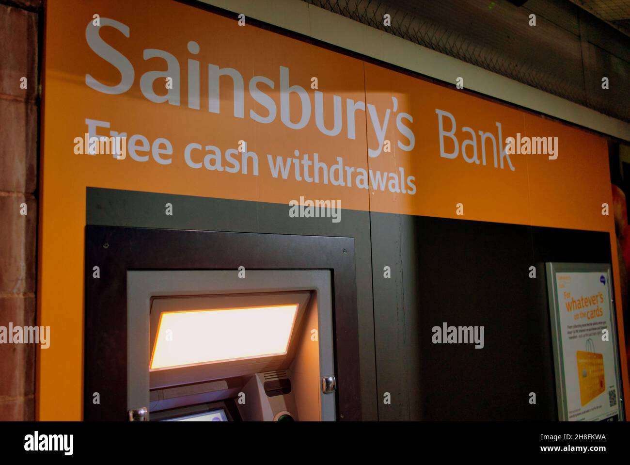 Sainsburys close up of hole in the wall bank cash dispenser Glasgow, Scotland, UK Stock Photo