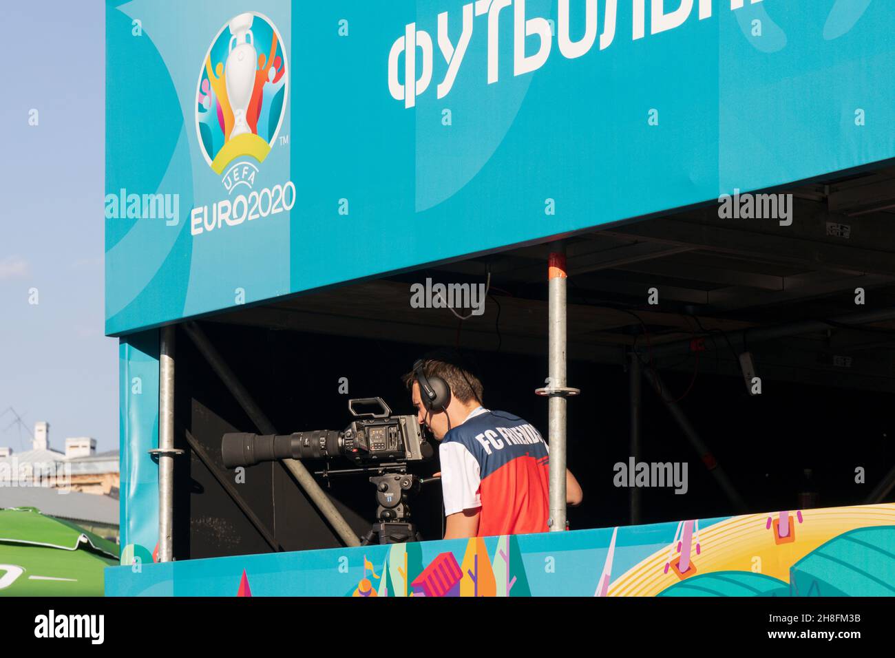 Saint-Petersburg, Russia - June 12, 2021: Fan zone at the Euro 2020 Football Championship with a platform and the operator carrying out the broadcast Stock Photo