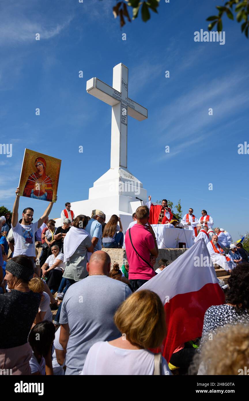 Solemnity of the Exaltation of the Holy Cross (also called the Triumph of the Cross) on the top of Krizevac (Cross Mountain) in Medjugorje. Stock Photo