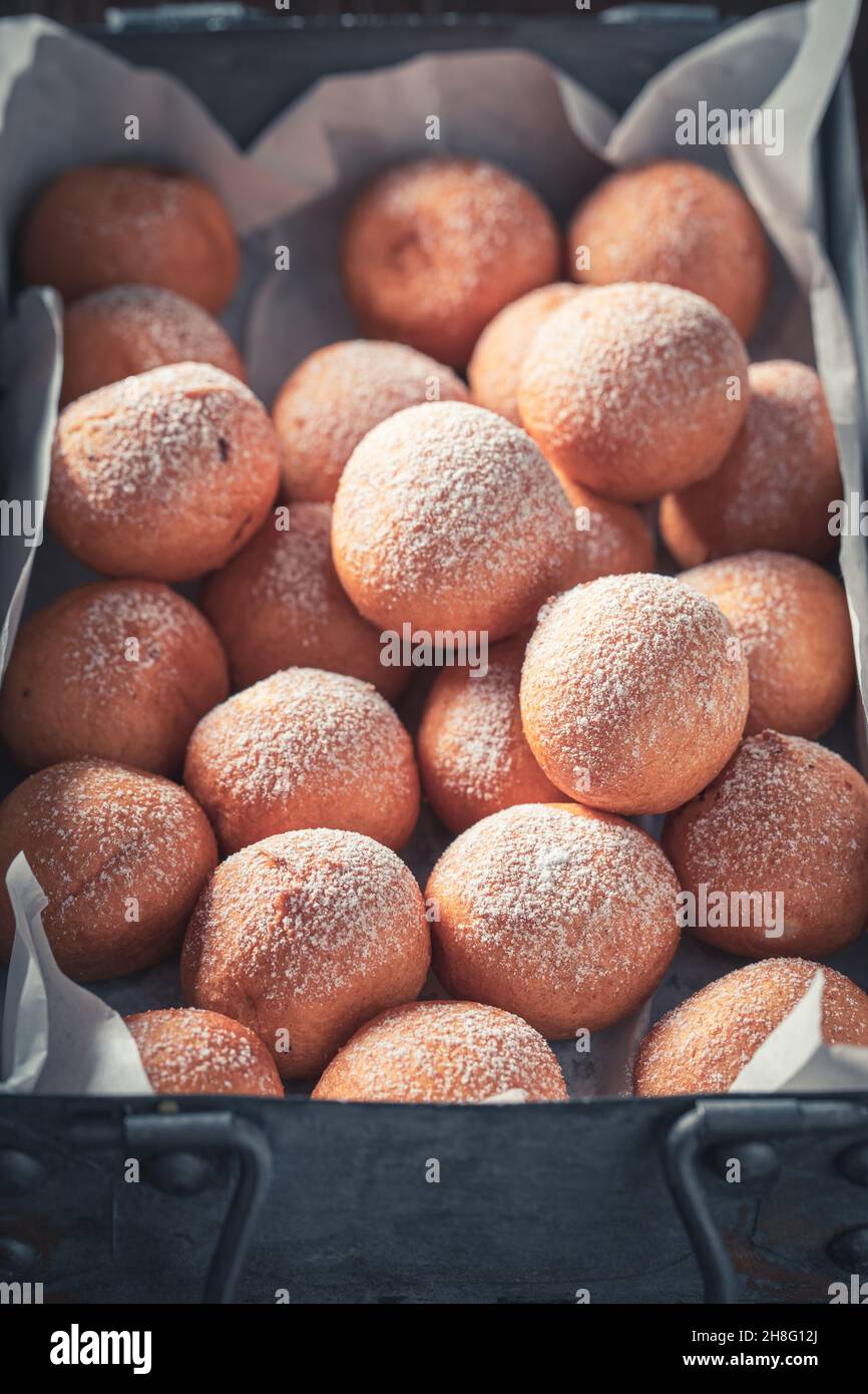 Homemade donut balls sparkling with sugar. Donuts baked at home. Simple
