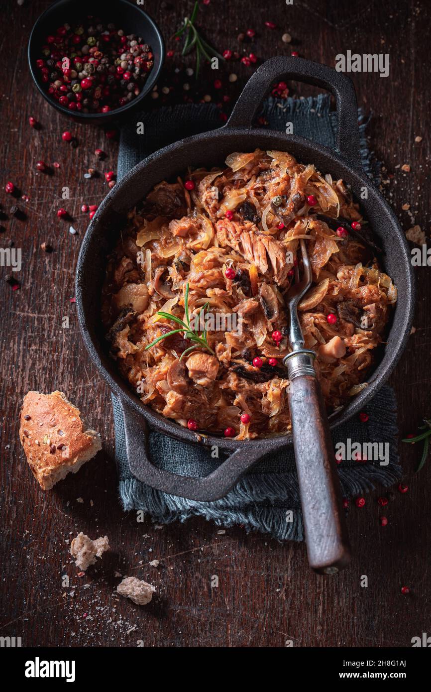 Tasty stewed cabbage and meat with cabbage and beef Bigos is traditional Polish food. Stock Photo