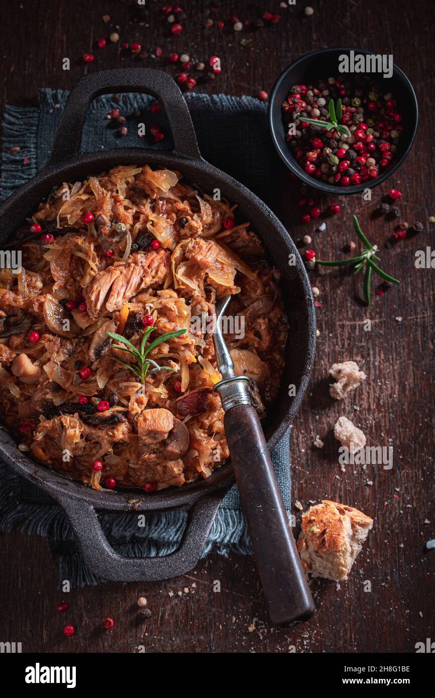 Spicy stewed cabbage and meat with cabbage and beef Bigos is traditional Polish food. Stock Photo