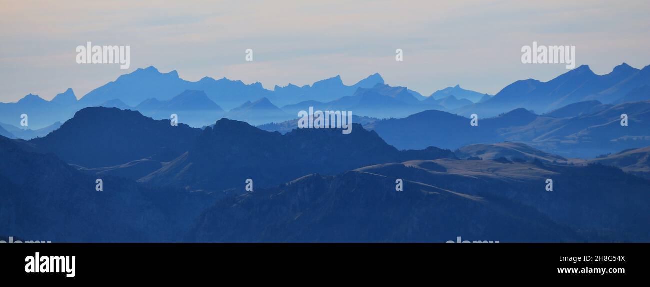 Outlines of mountain ranges seen from Mount Niesen, Switzerland. Stock Photo