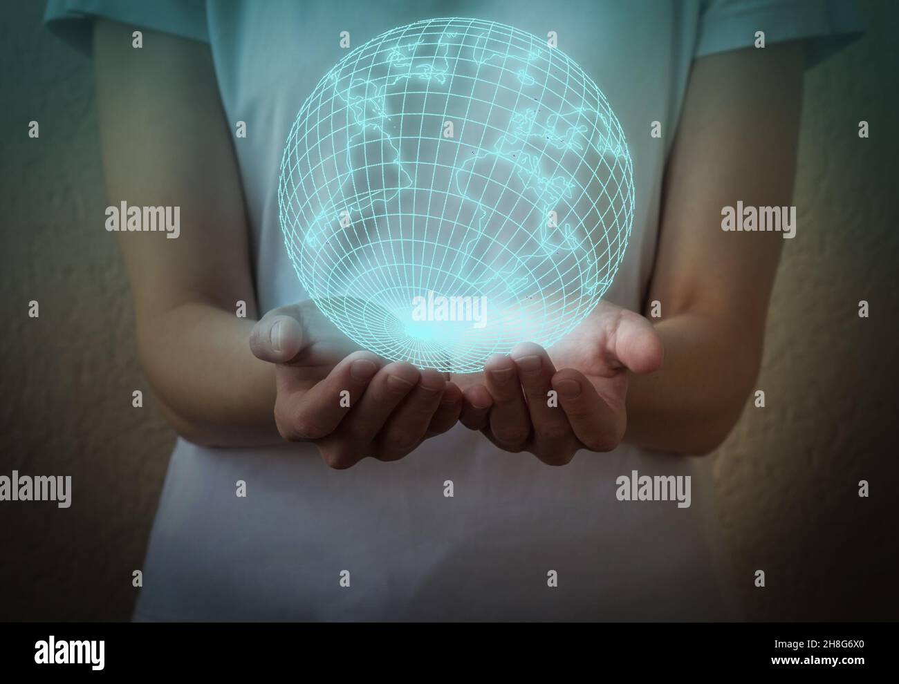 Woman's hands holding the earth globe. Global business concept Stock Photo