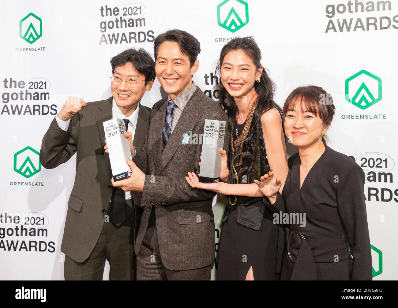New York, NY - November 29, 2021: Lee Jung-jae, Hwang Dong-hyuk, Jung Ho-yeon, Kim Ji-yeon pose in Green Room as winners for breakthrough series Squid Game at Cipriani Wall Street Stock Photo