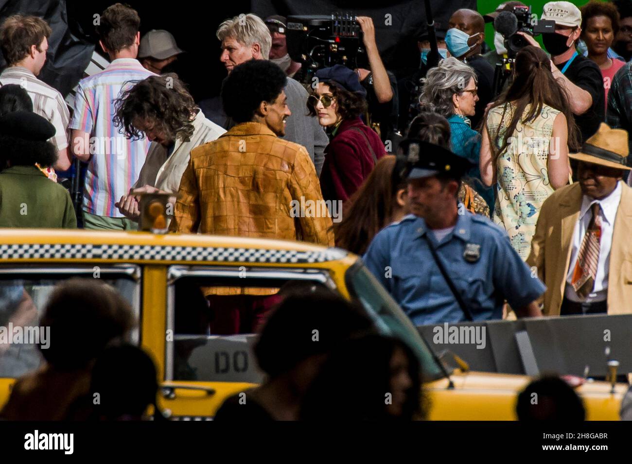 Harrison Ford's double and Phoebe WallerBridge are spotted on set in