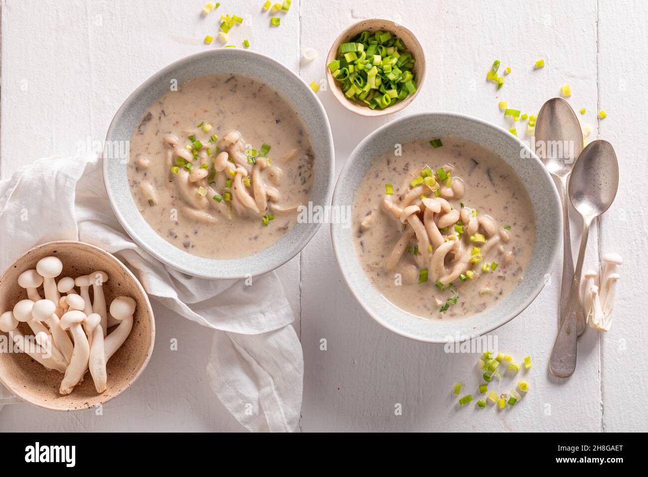 Creamy shimeji mushroom soup with cream and chives. Japanese mushroom