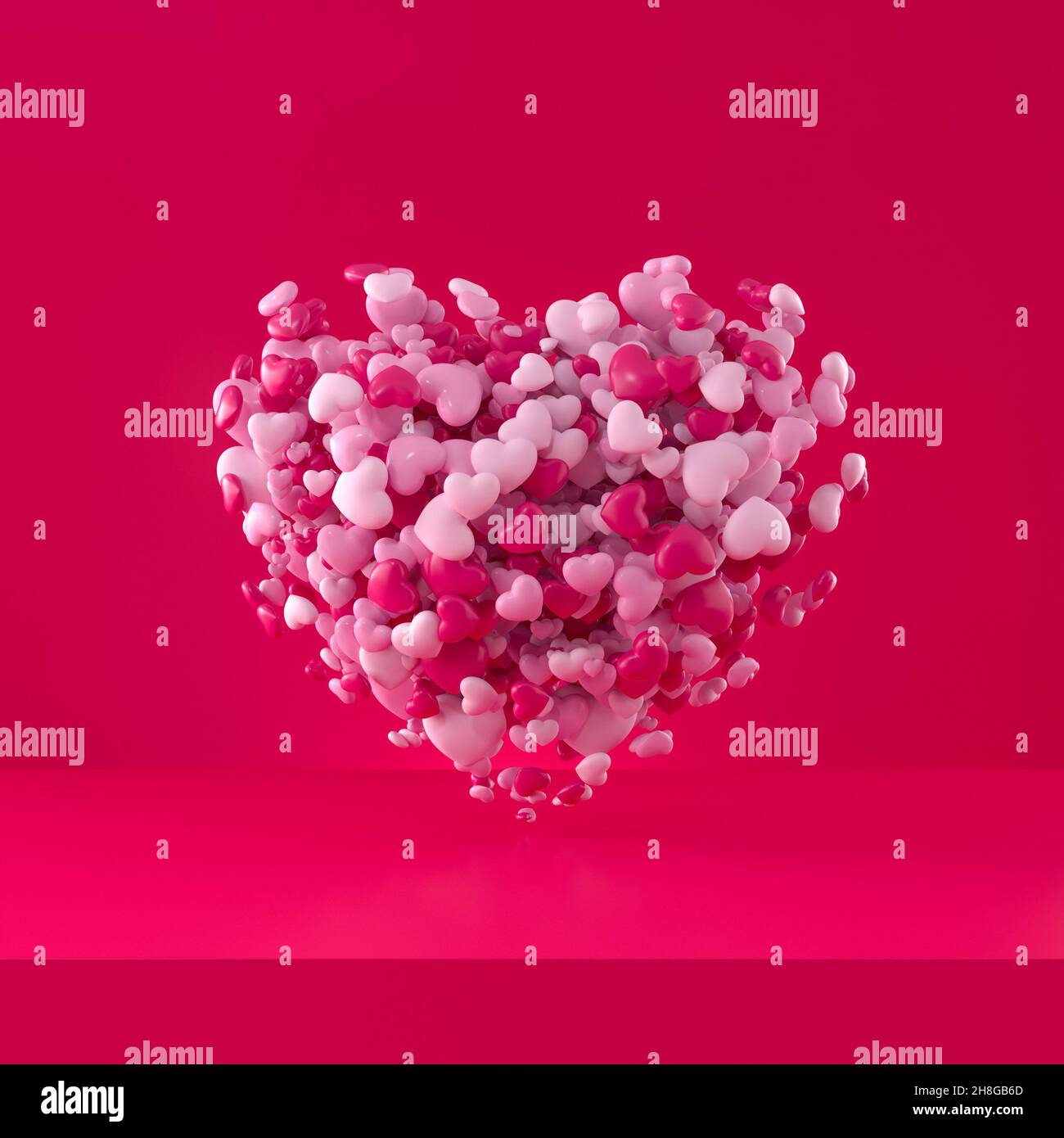 Giant heart full of pink hearts on pink studio background. passion and