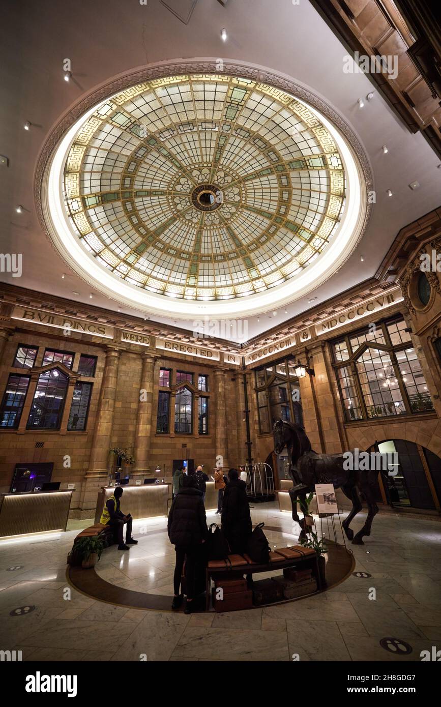 Manchester city centre Kimpton Clocktower Hotel reception lobby with large roof glass dome Stock Photo